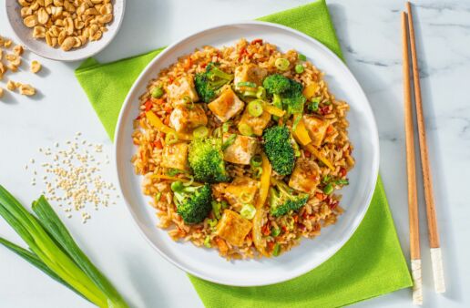 sesame-tofu-stir-fry-with-broccoli-florets-yellow-bell-peppers-green-onion-and-stir-fry-sauce